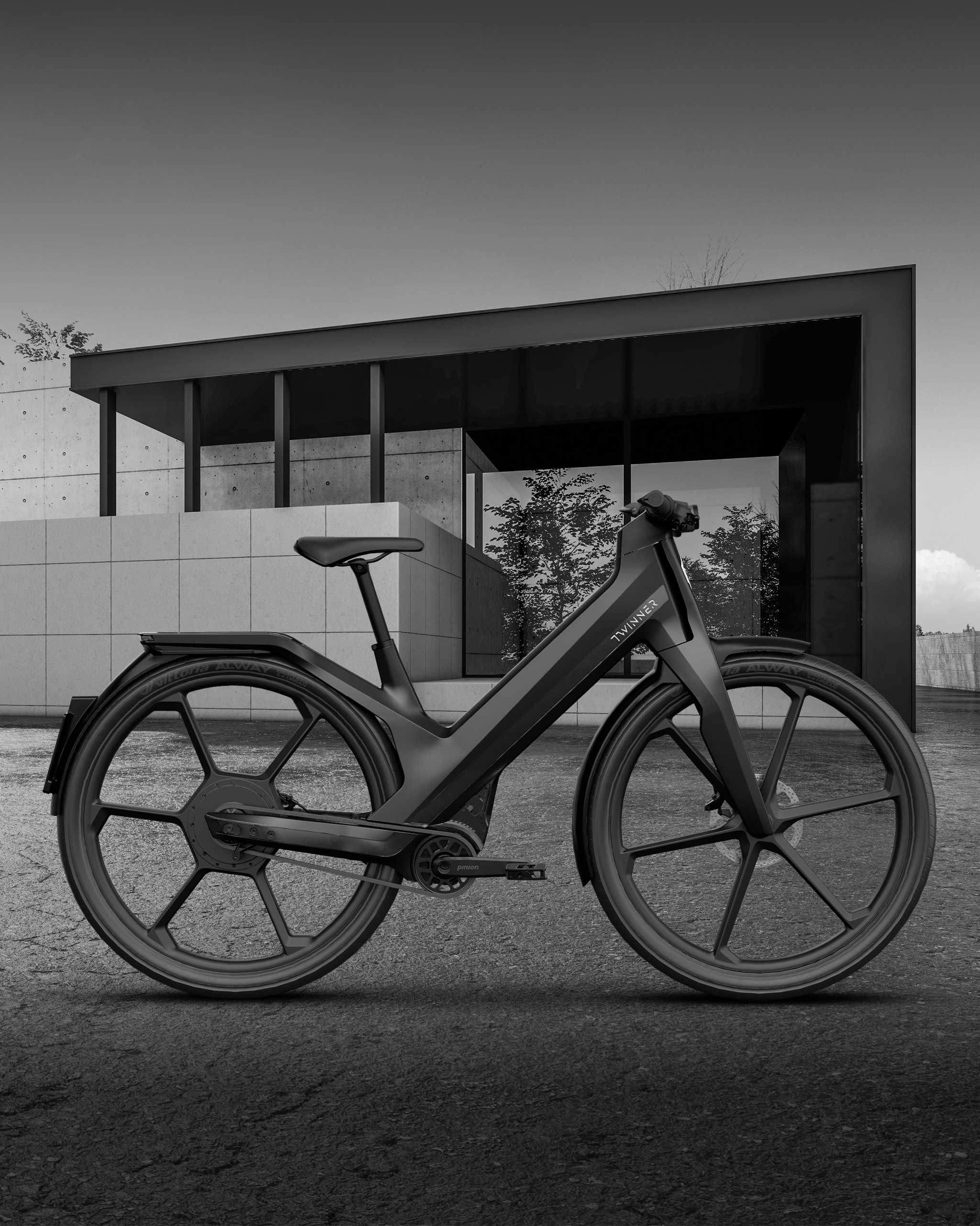 Twinner E-Bike petrol, parkiert vor Design Haus